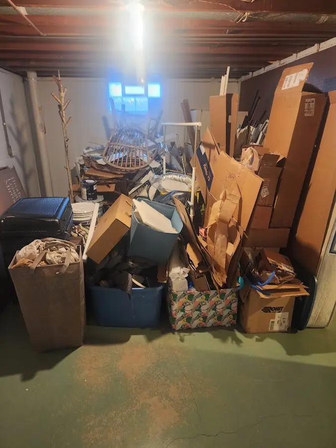 Roll-off dumpster container at job site for 8 Yard Dumpster Rental in Sun City Center